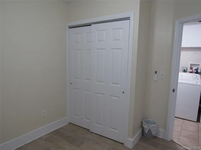 a bathroom with a toilet and a shower curtain