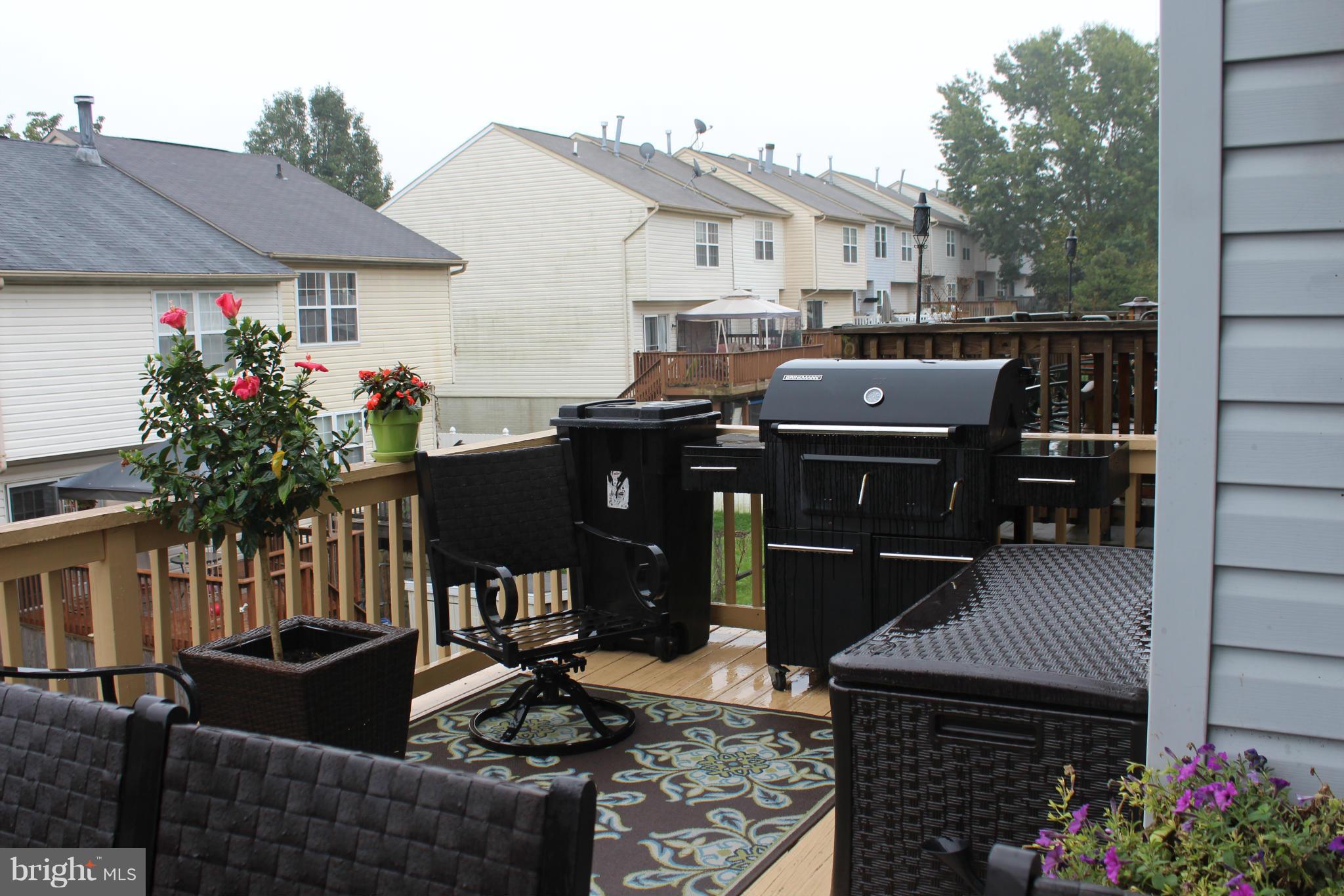 53 Powder View Court Baltimore, MD 21236 - Photo 24 of 28 Newer sliders in DR leading to deck