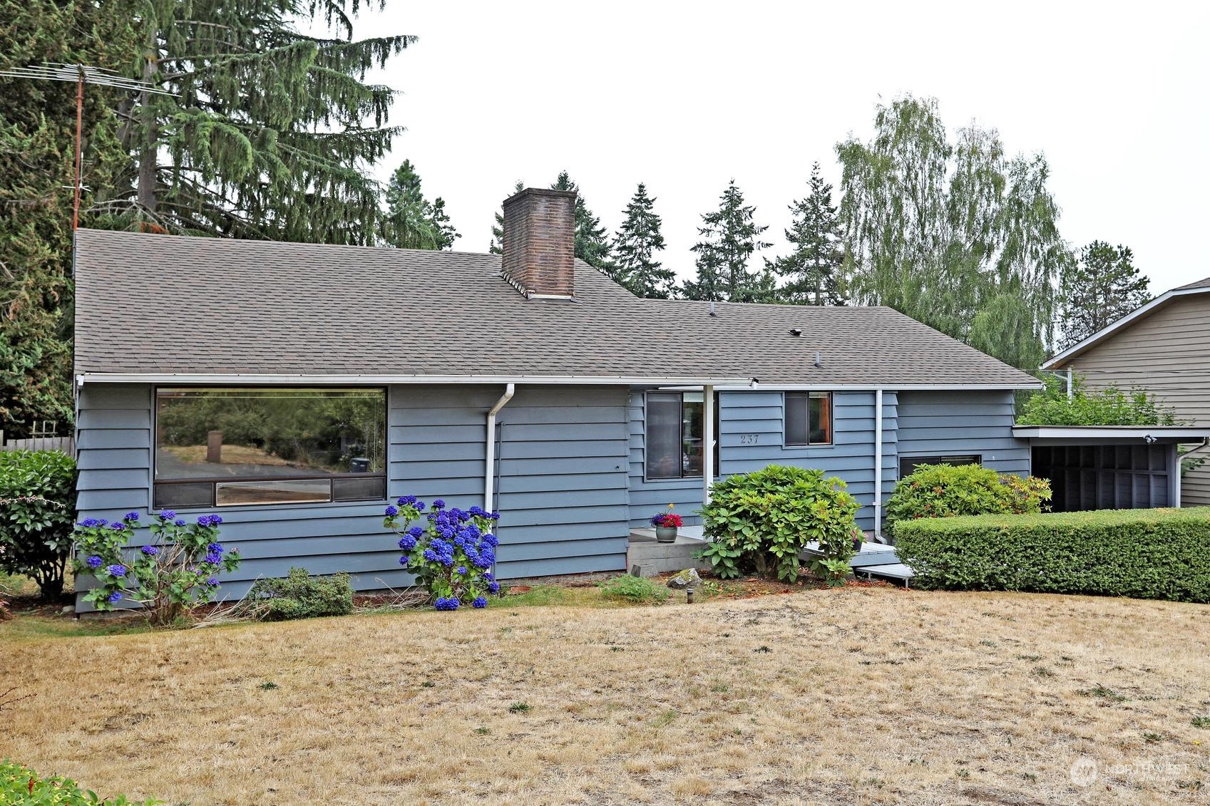 237 South 197th Street Des Moines, WA 98148 - Photo 2 of 29 a front view of a house with a yard