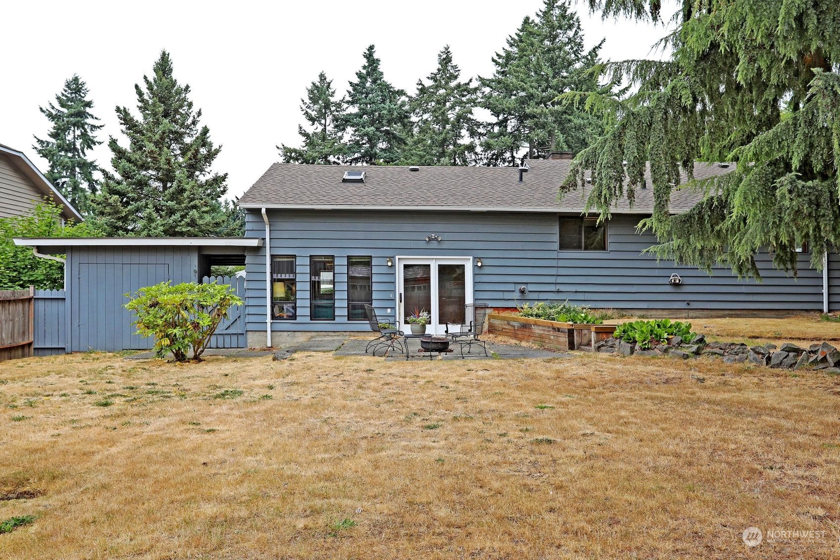 237 South 197th Street Des Moines, WA 98148 - Photo 23 of 29 a backyard of a house with seating space