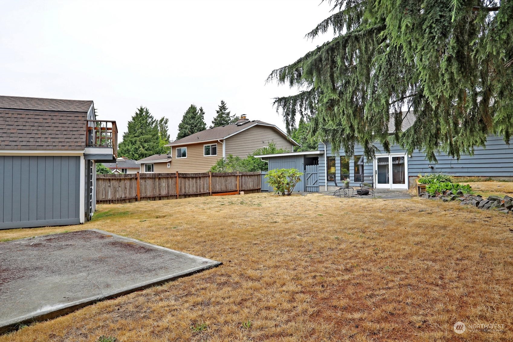 237 South 197th Street Des Moines, WA 98148 - Photo 25 of 29 a front view of a house with a yard