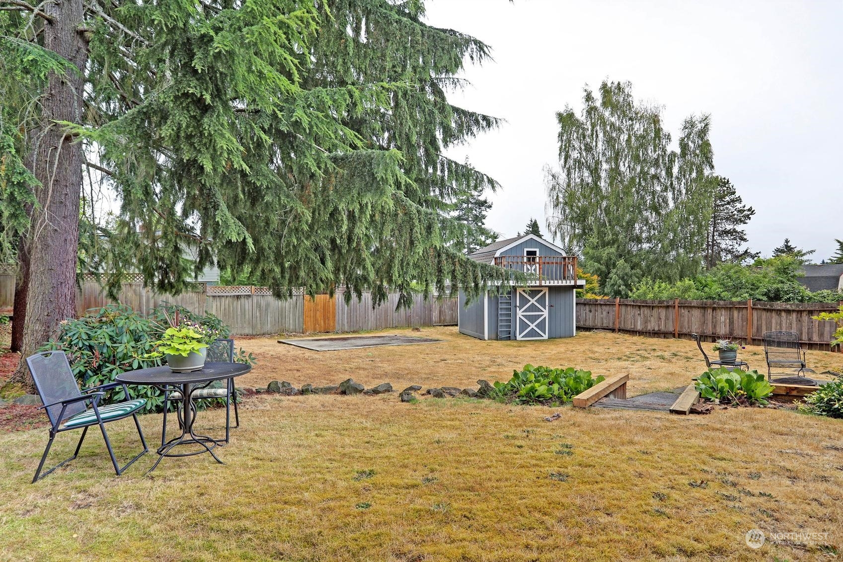 237 South 197th Street Des Moines, WA 98148 - Photo 27 of 29 a house with yard in front of it