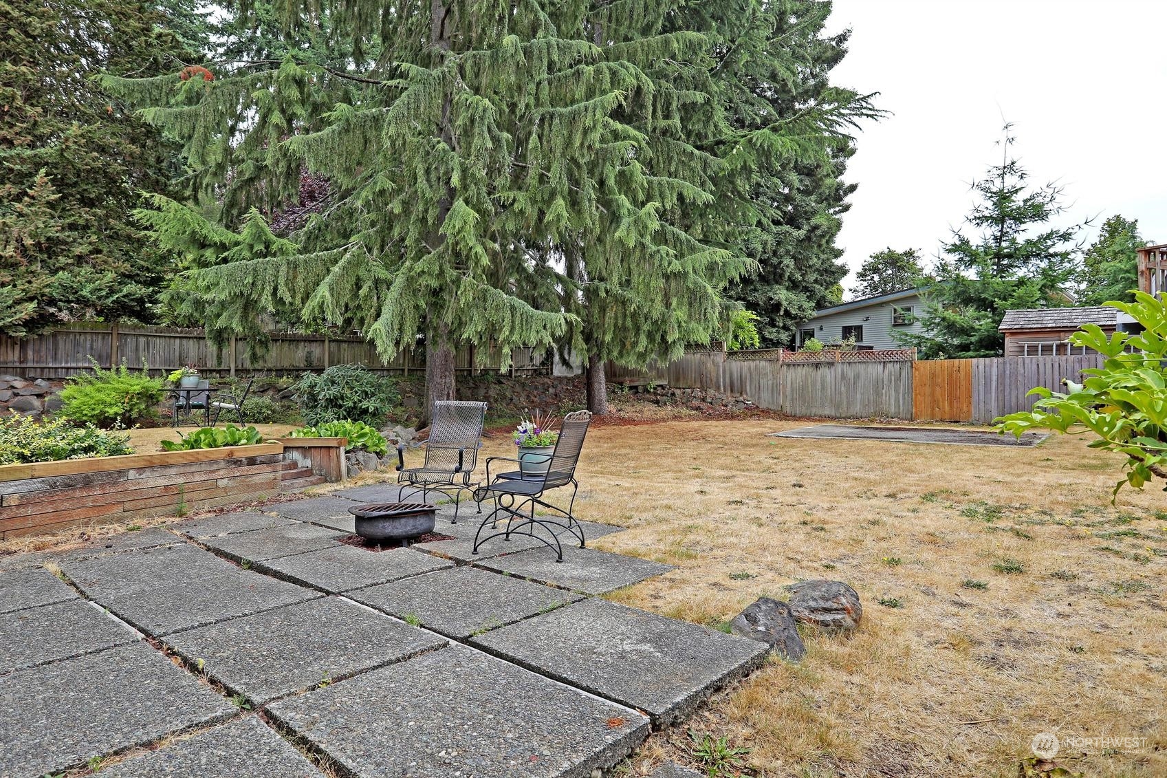 237 South 197th Street Des Moines, WA 98148 - Photo 29 of 29 a view of a backyard with sitting area
