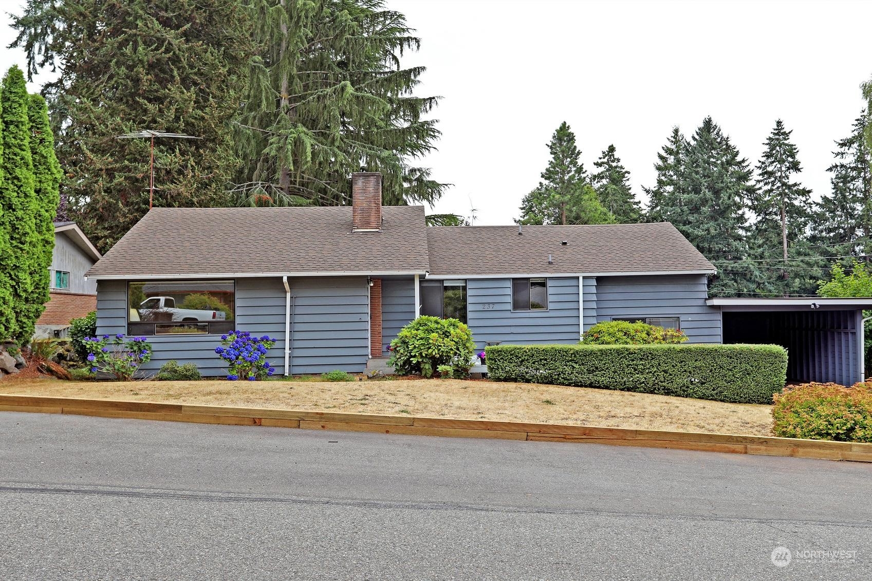 237 South 197th Street Des Moines, WA 98148 - Photo 3 of 29 front view of a house with a garden