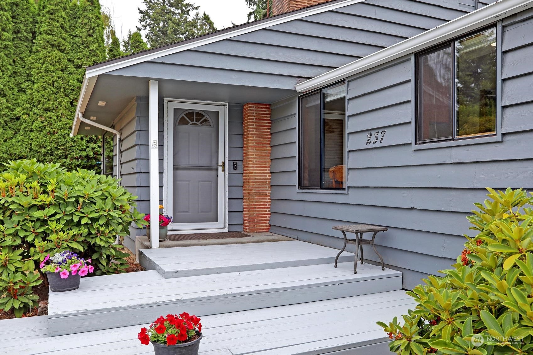 237 South 197th Street Des Moines, WA 98148 - Photo 4 of 29 a front view of a house with a potted plant