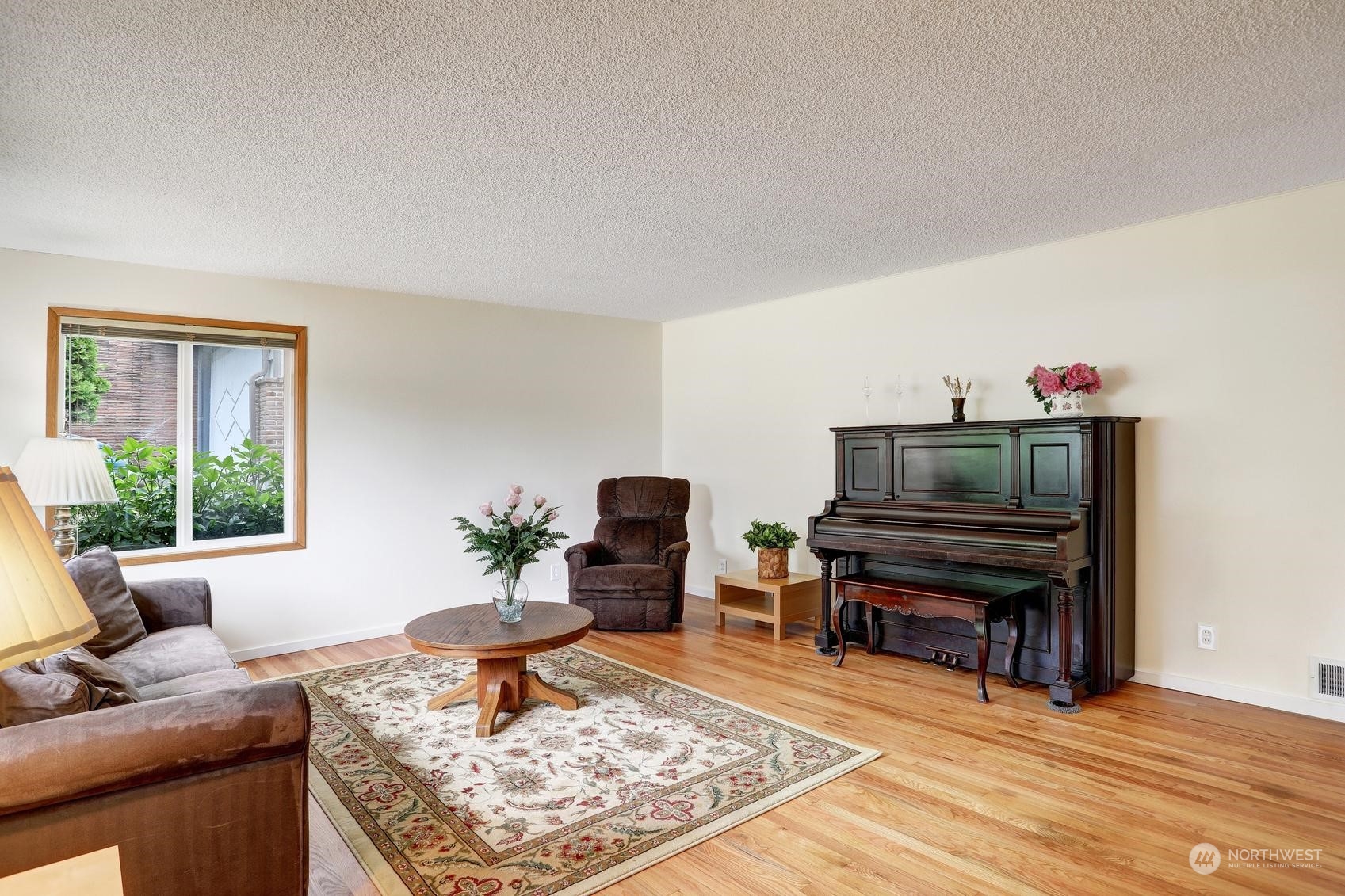 237 South 197th Street Des Moines, WA 98148 - Photo 6 of 29 a living room with furniture and a piano