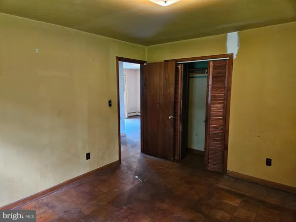 an empty room with closet