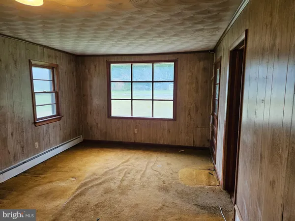 an empty room with windows