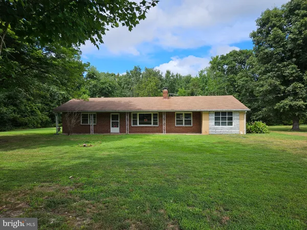 a view of a house with a big yard