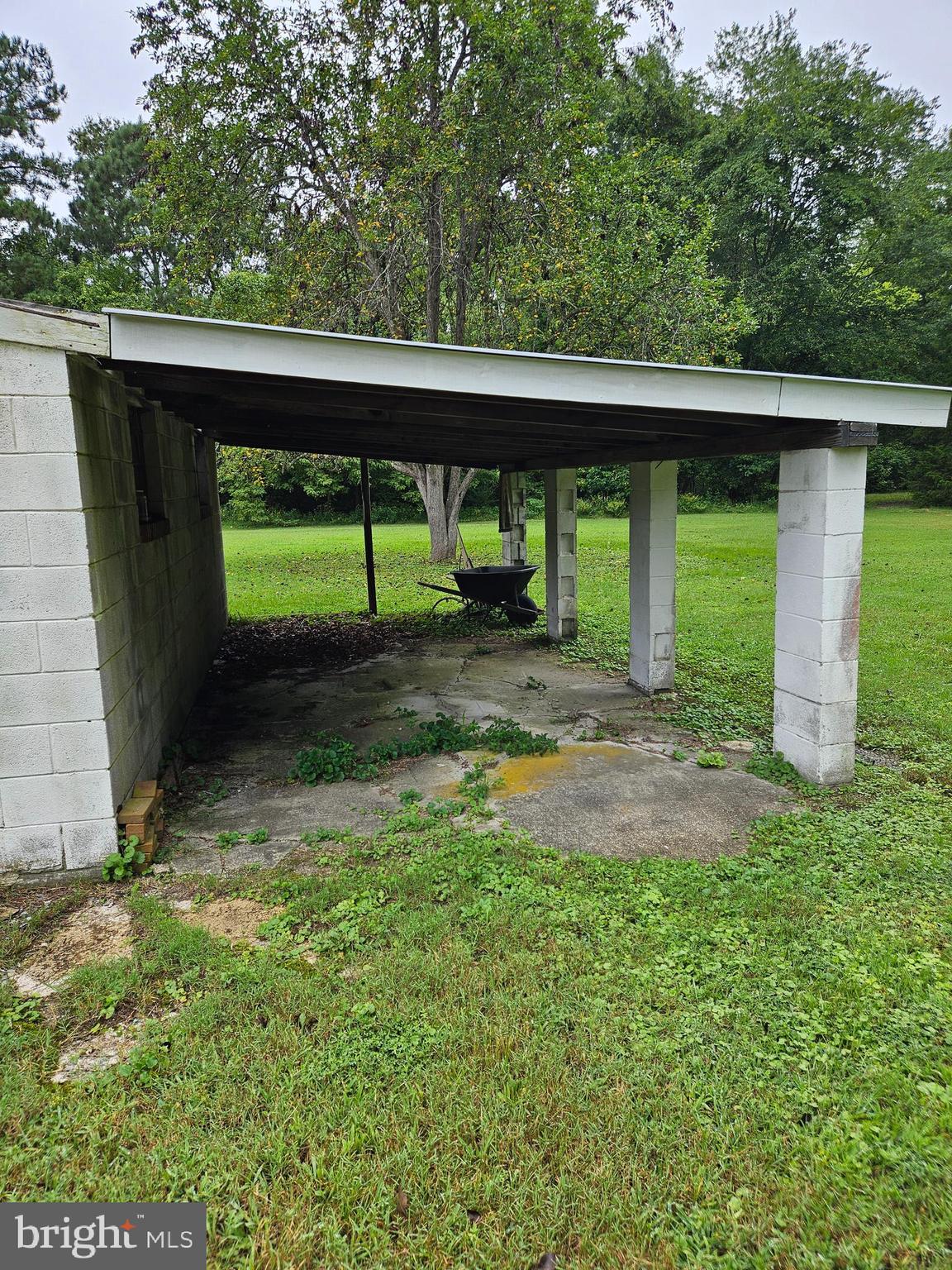 16485 Dawn Boulevard Hanover, VA 23069 - Photo 24 of 29 a view of a small yard with wooden fence