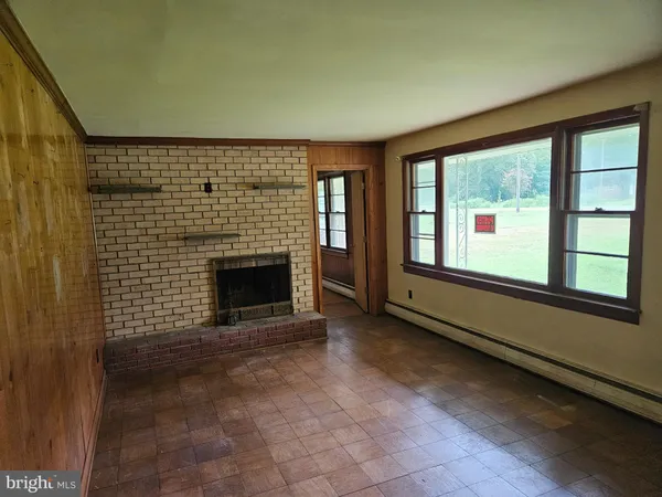 a living room with a fireplace