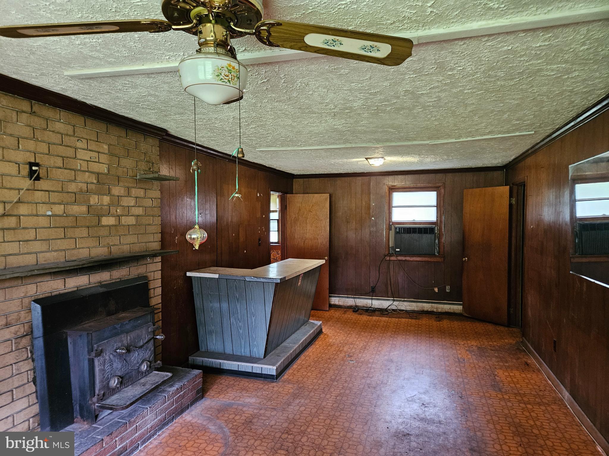 16485 Dawn Boulevard Hanover, VA 23069 - Photo 10 of 29 a room with fireplace and cabinets