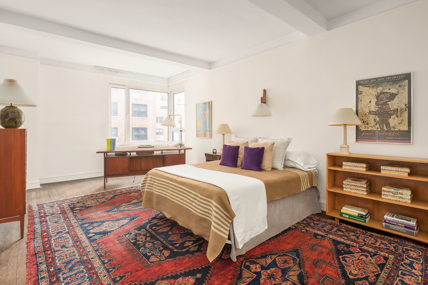 5 Riverside Drive, Unit 11C Manhattan, NY 10023 - Photo 7 of 12 a bedroom with a bed and wooden floor