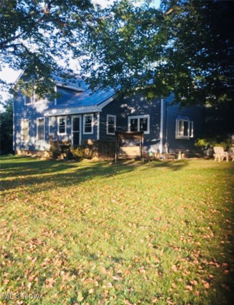 436 Keefus Road Conneaut, OH 44030 - Photo 28 of 30 Back of house with a lawn
