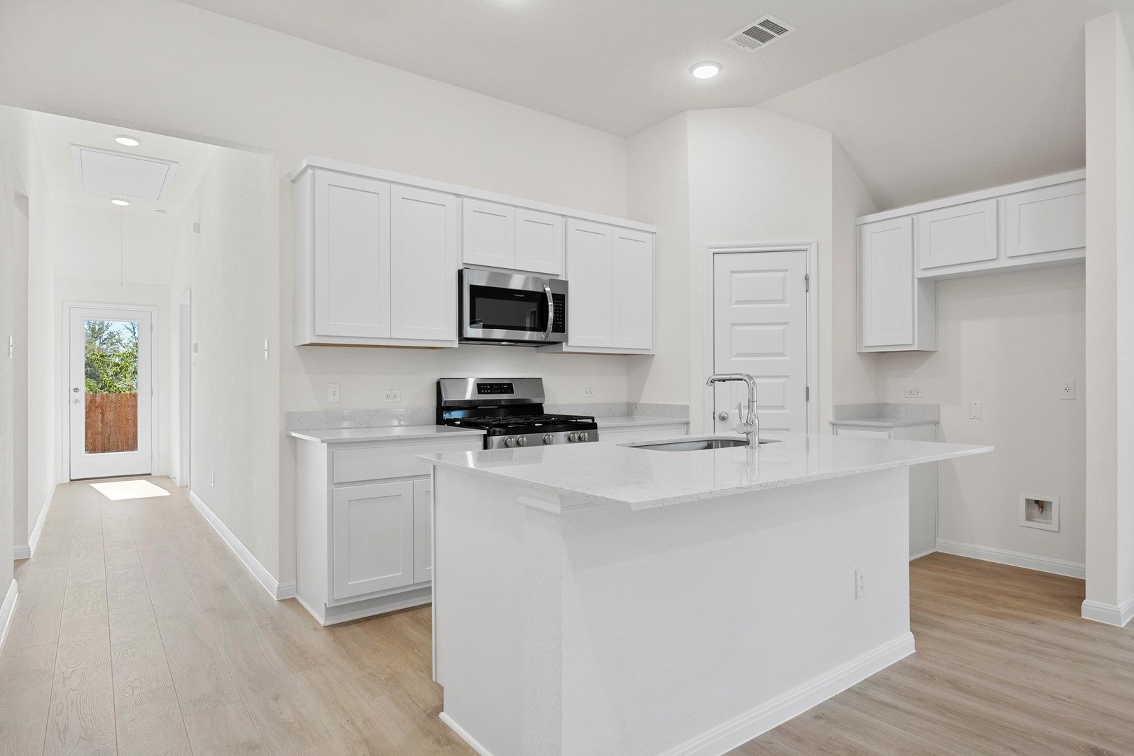 31018 Rena Coast Drive Huffman, TX 77336 - Photo 7 of 25 Kitchen in the Cypress home plan by Trophy Signature Homes - REPRESENTATIVE PHOTO