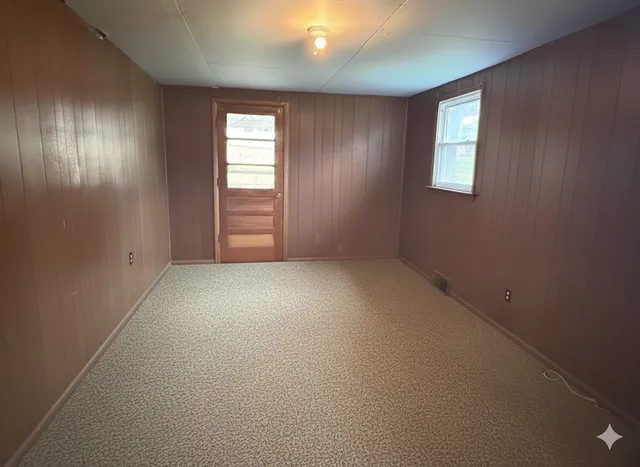 an empty room with windows