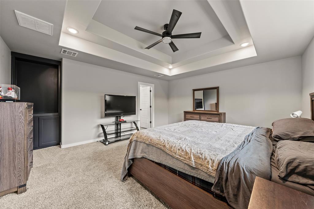 1034 Antelope Trail Temple, TX 76504 - Photo 10 of 24 a bedroom with a bed and a flat screen tv