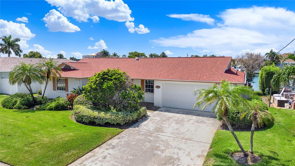 411 Palm Island Northeast Clearwater Beach, FL 33767 - Photo 1 of 20
