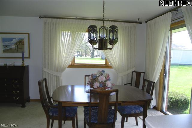 2434 Woodview Road Uniontown, OH 44685 - Photo 9 of 23 Formal dining area w/ slider to back yard