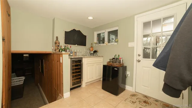 a kitchen with a stove and a refrigerator