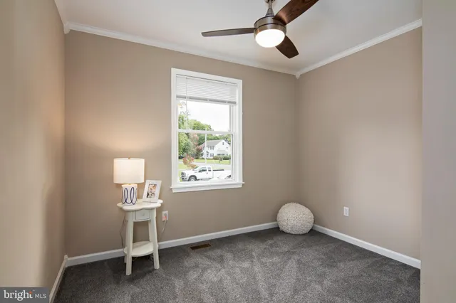 a bedroom with bed and a window