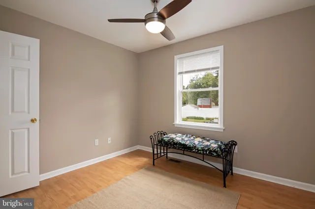 a bathroom with a double vanity sink toilet and shower