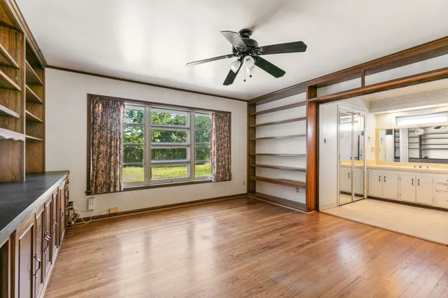 a bath room with a toilet a sink and a bath tub