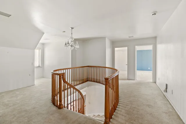 a view of a house with backyard and garden