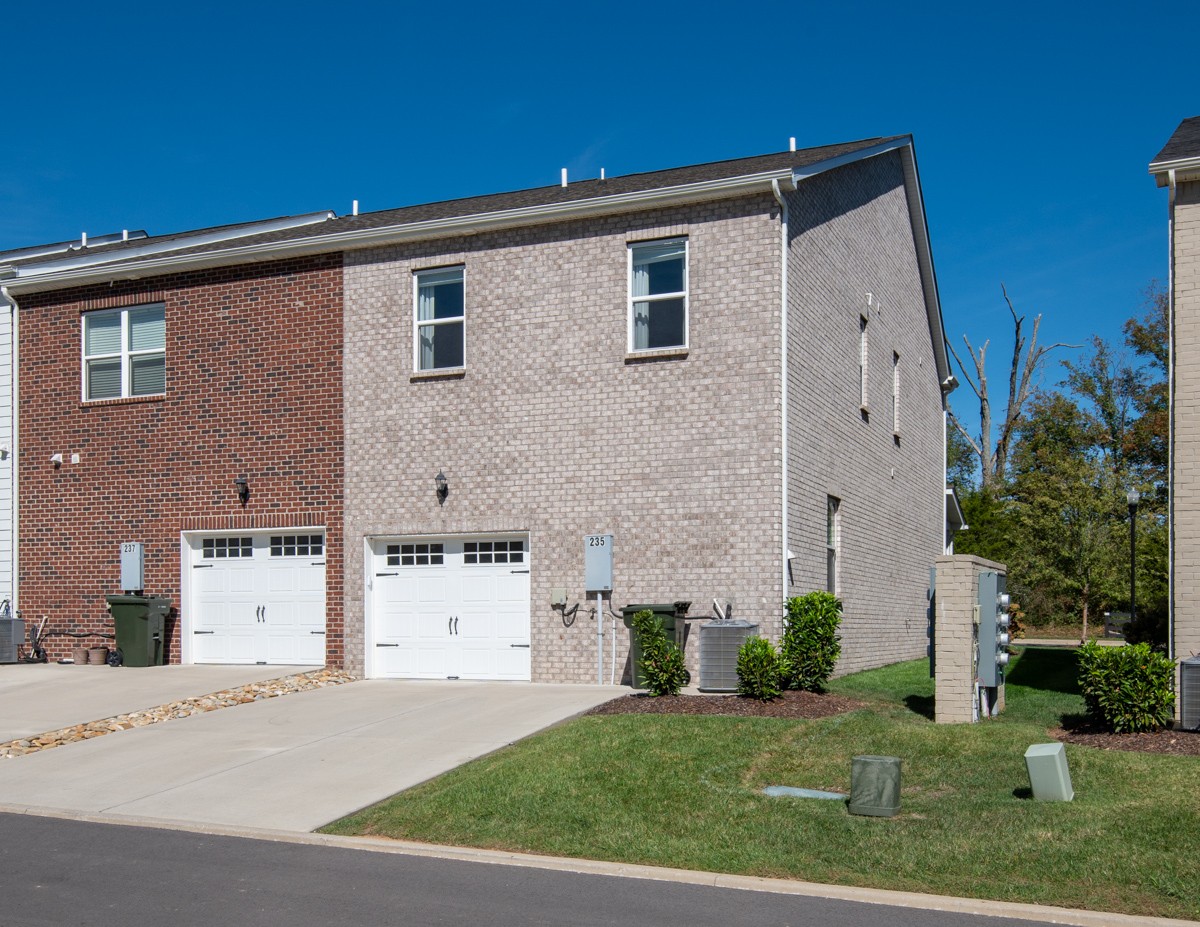 235 Grandstand Boulevard Gallatin, TN 37066 - Photo 24 of 26 a front view of a house with a yard