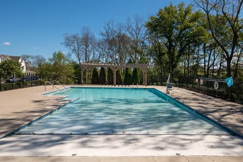 a view of a swimming pool with an outdoor space