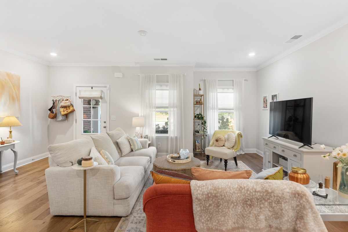 235 Grandstand Boulevard Gallatin, TN 37066 - Photo 5 of 26 a living room with furniture and a flat screen tv