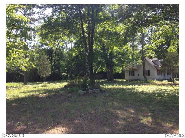 15001 Beach Road Chesterfield, VA 23838 - Photo 2 of 3 a view of a yard with a tree