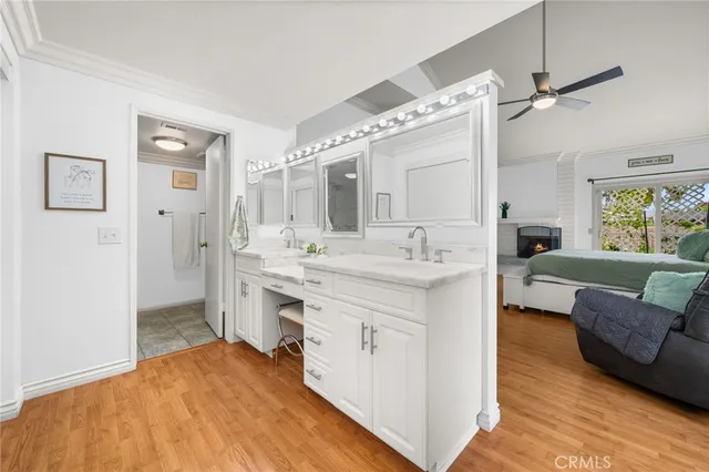 a spacious bathroom with a double vanity sink mirror and