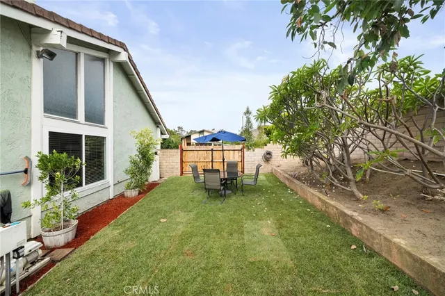 a house with garden in front of it