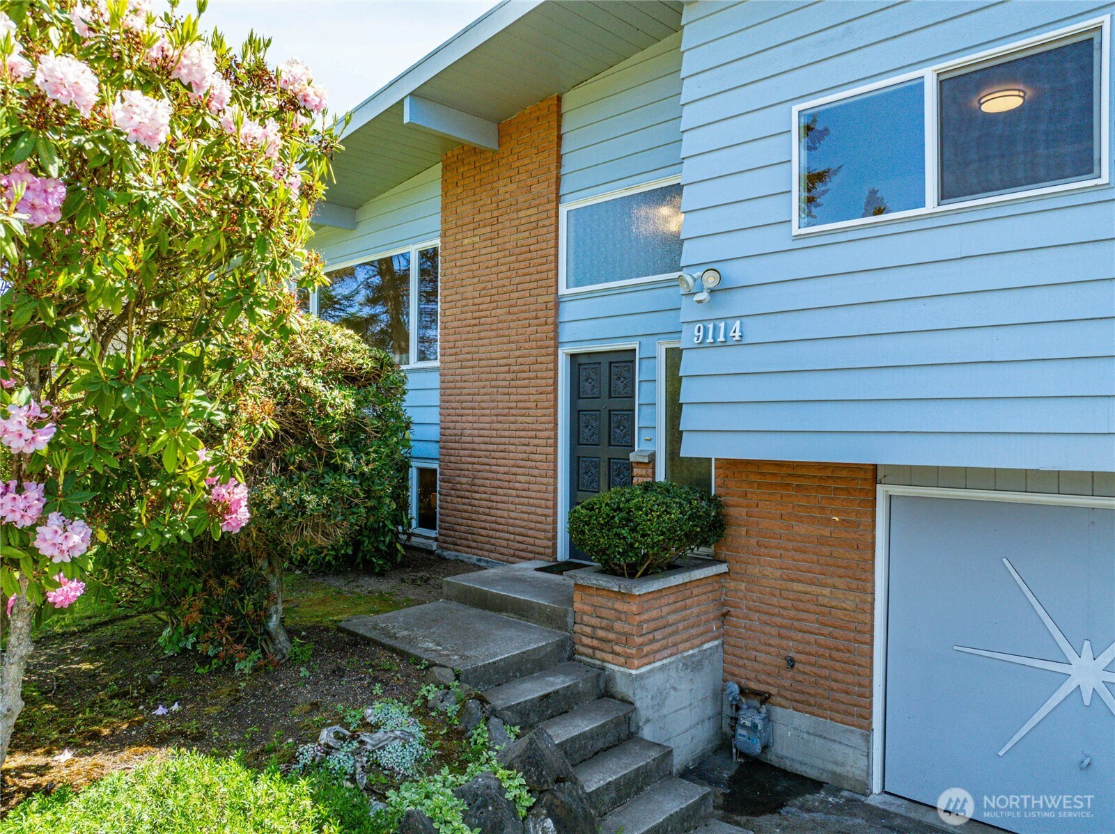 9114 207th Place Southwest Edmonds, WA 98026 - Photo 2 of 36 a view of a house with a yard