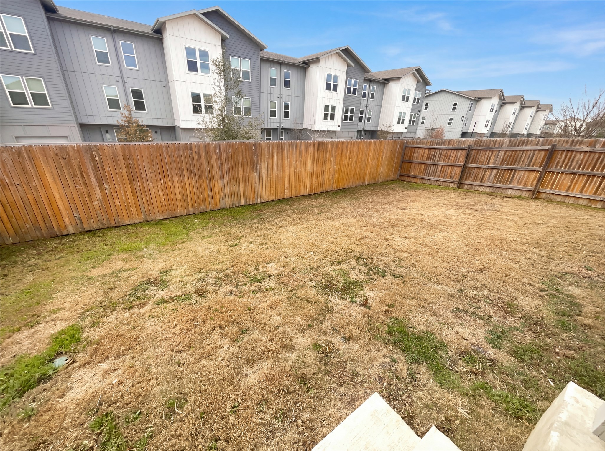 413 Dubina Avenue Georgetown, TX 78626 - Photo 19 of 22 Fenced backyard with a residential view