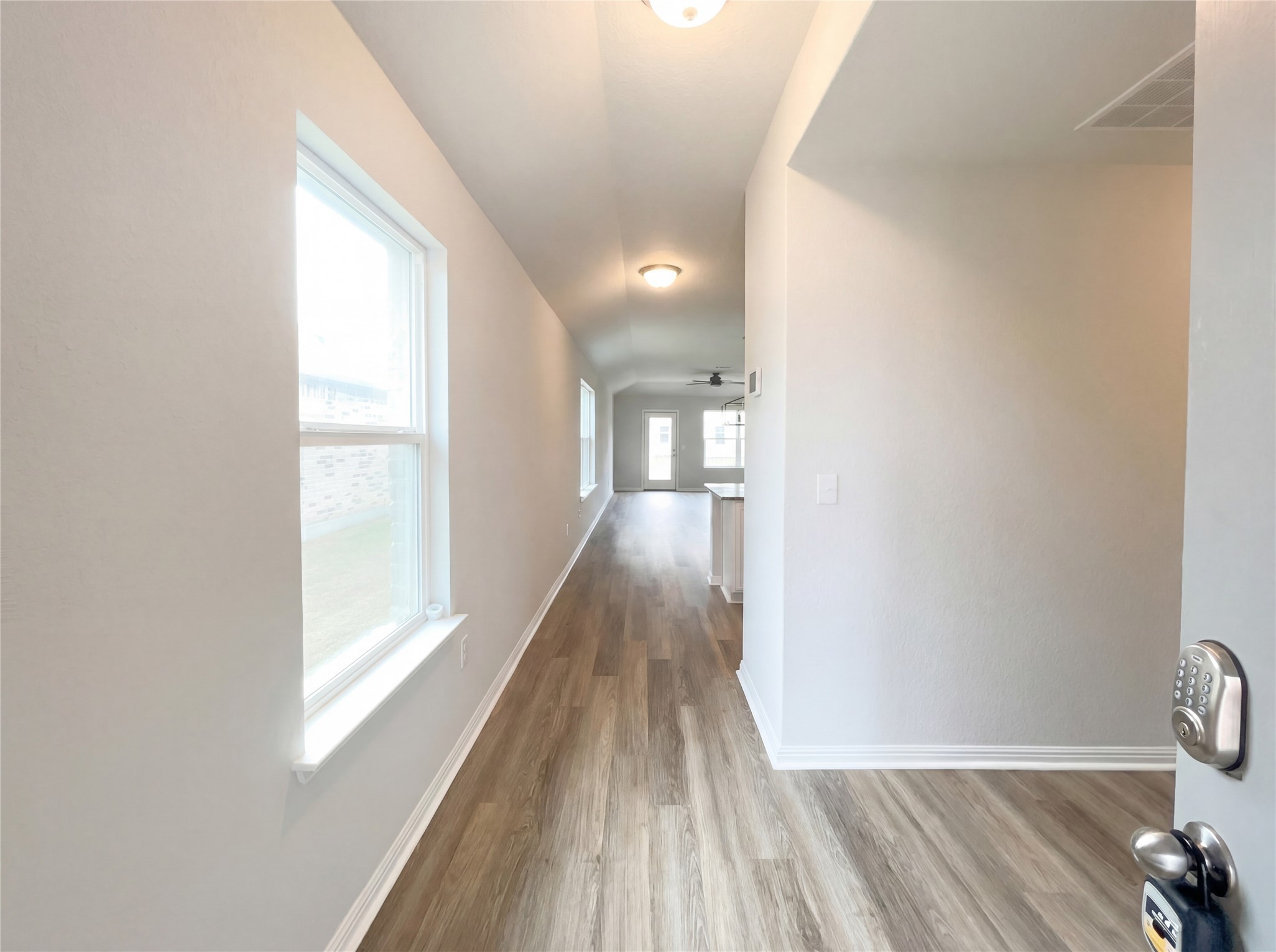 413 Dubina Avenue Georgetown, TX 78626 - Photo 6 of 22 Hall featuring dark wood finished floors and baseboards
