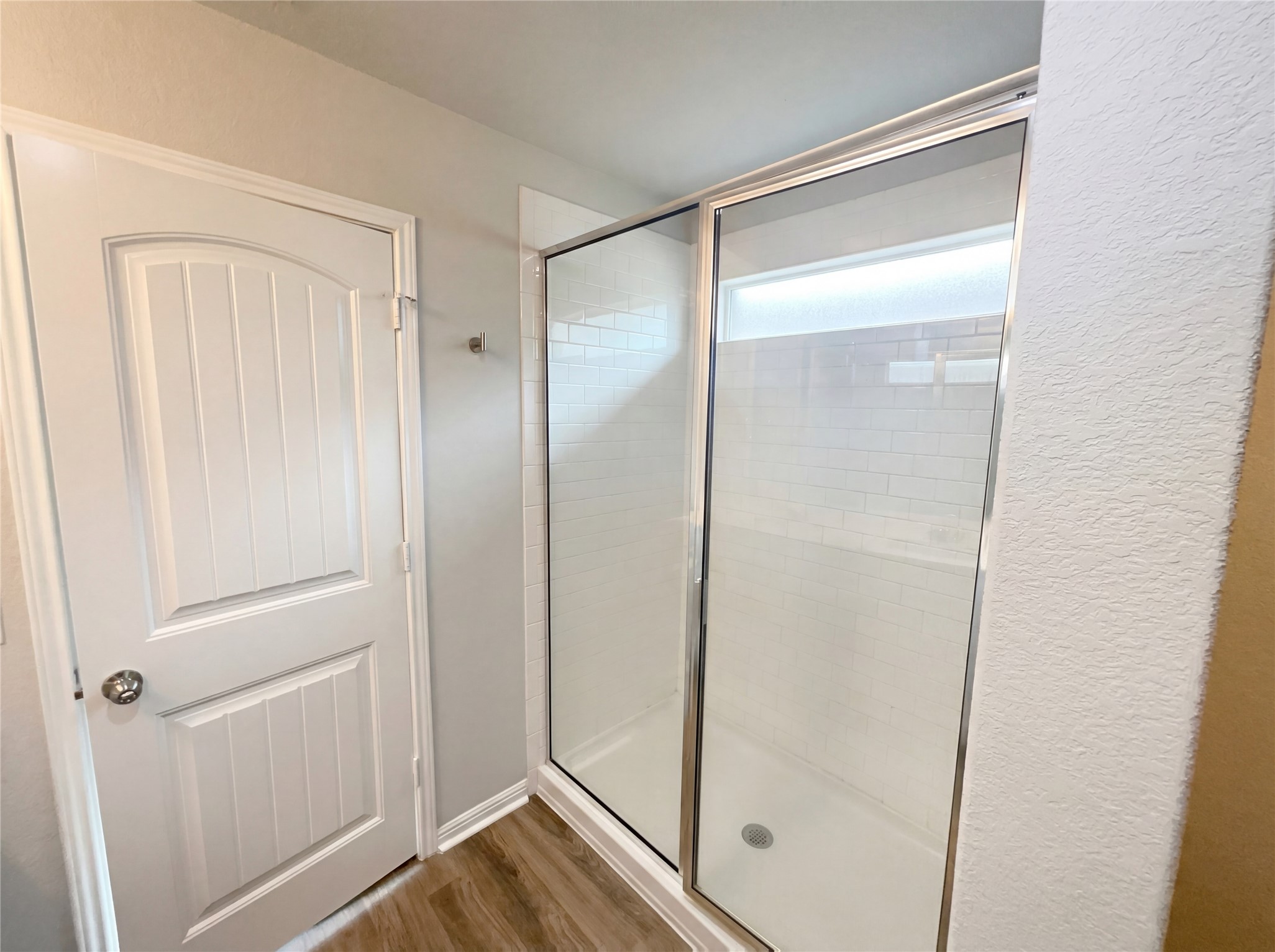 413 Dubina Avenue Georgetown, TX 78626 - Photo 10 of 22 Full bathroom with a shower stall and wood finished floors