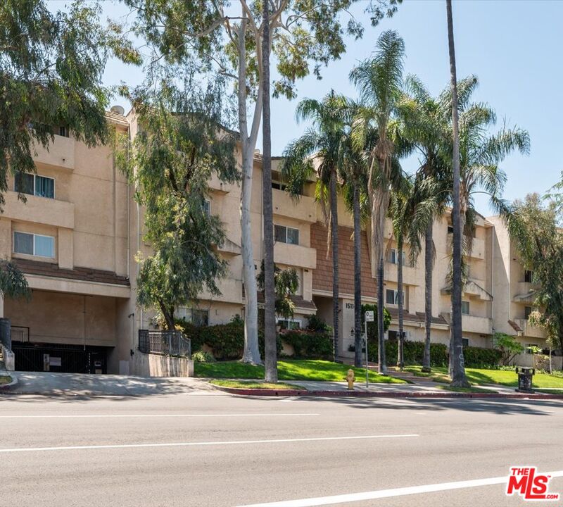 15114 Sherman Way, Unit 104 Van Nuys, CA 91405 - Photo 19 of 19 front view of a building with a garden