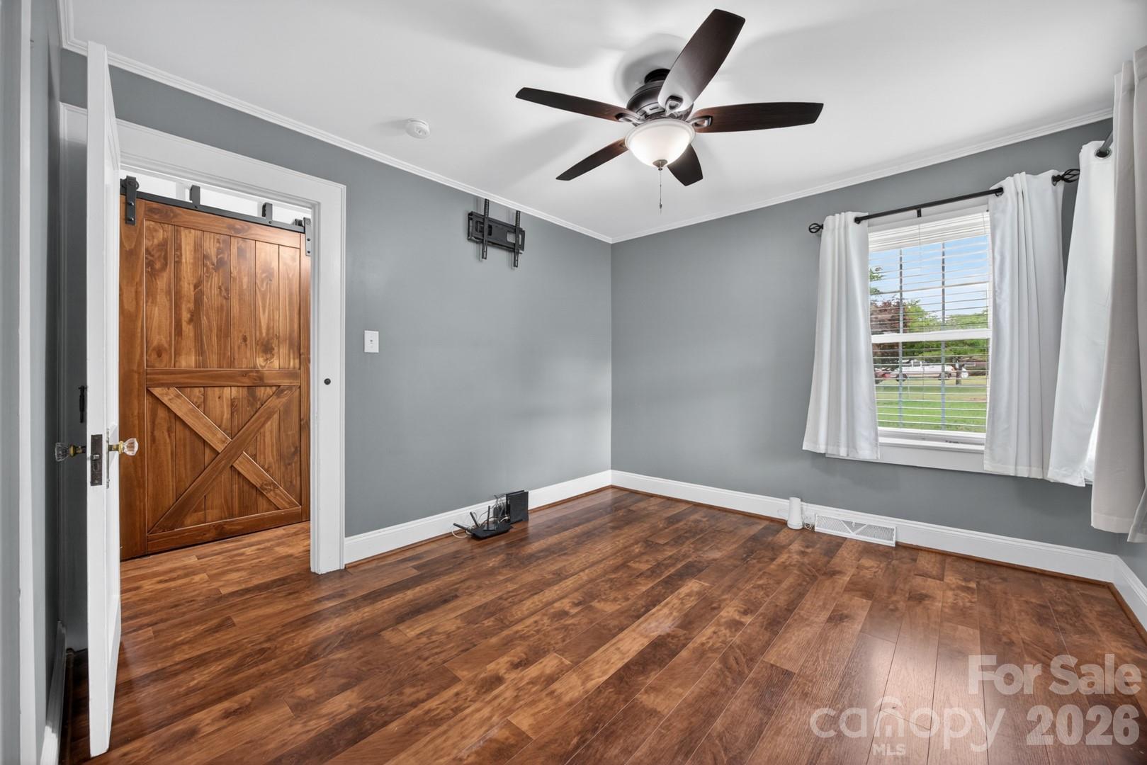 1016 Raney Street Salisbury, NC 28146 - Photo 17 of 45 wooden floor in an empty room with a window
