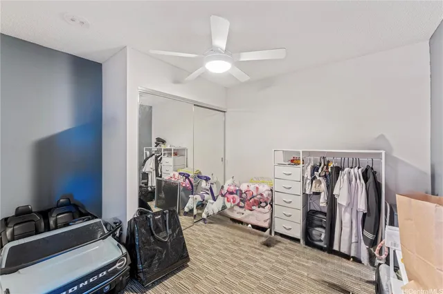 a kitchen with a sink cabinets and a window