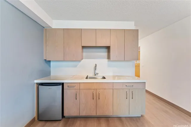 a bed room with a bed and a window