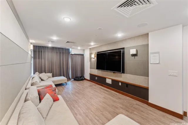 a view of a building with a big yard and garden