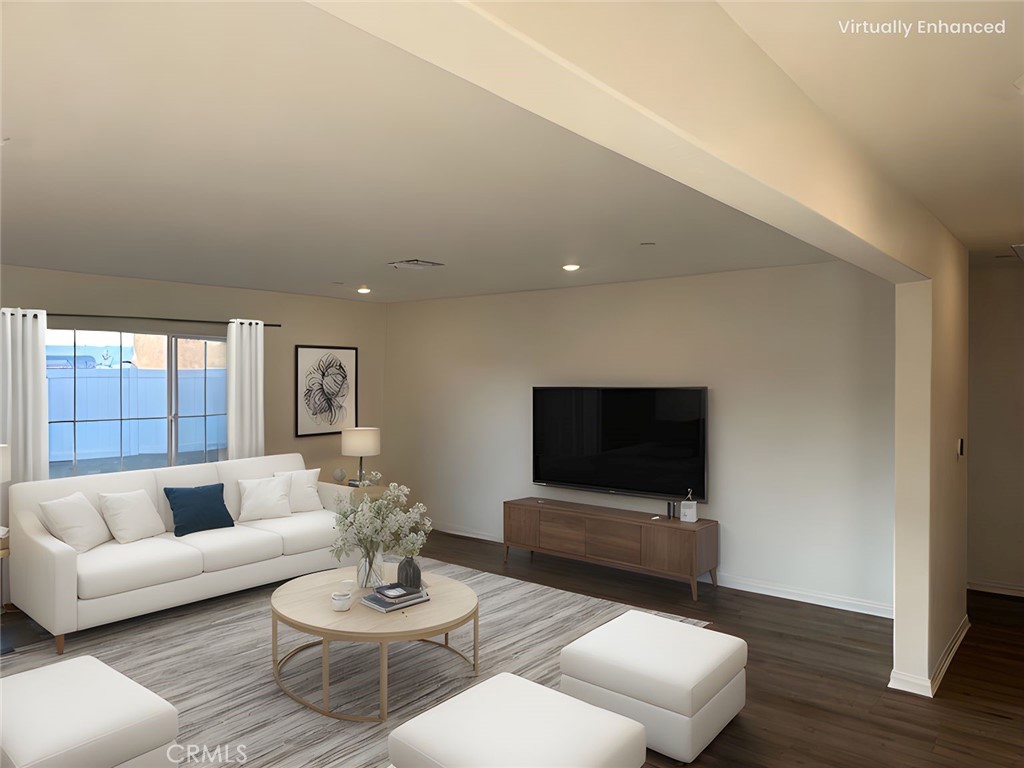 916 Runaway Trail San Jacinto, CA 92582 - Photo 2 of 23 a living room with furniture a flat screen tv and a large window