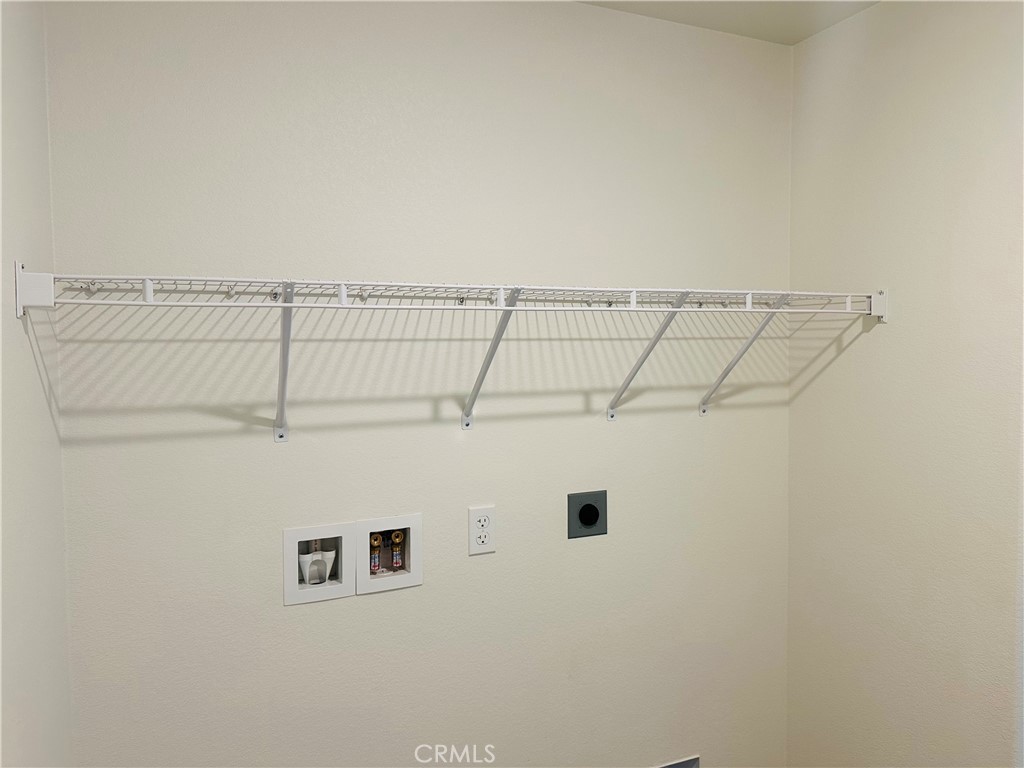 916 Runaway Trail San Jacinto, CA 92582 - Photo 22 of 23 a close view of a refrigerator in kitchen