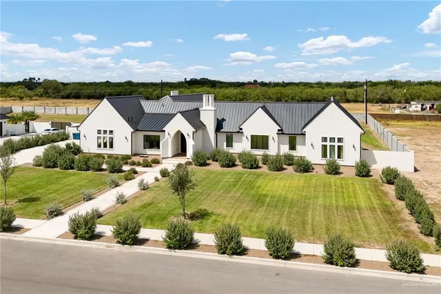 a view of house with garden