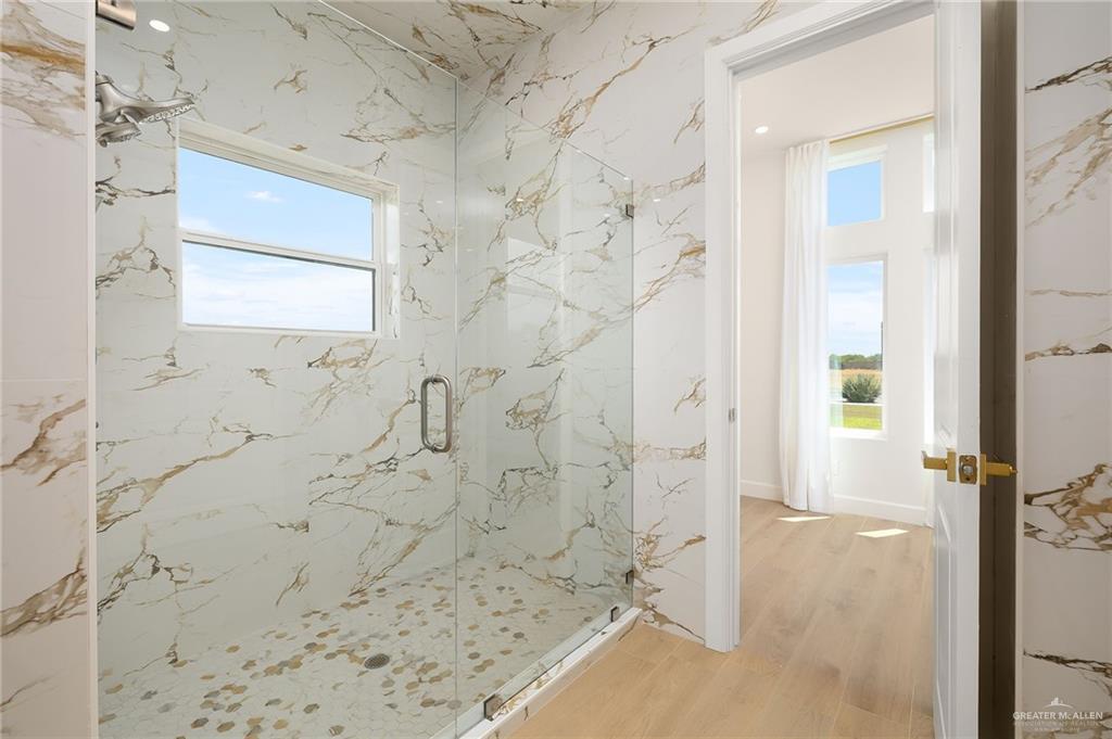 1215 Chelsea Drive Palmhurst, TX 78573 - Photo 23 of 30 a bathroom with a shower