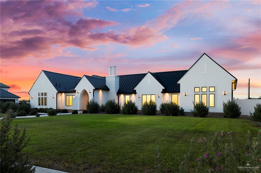 1215 Chelsea Drive Palmhurst, TX 78573 - Photo 3 of 30 a front view of house with yard and green space