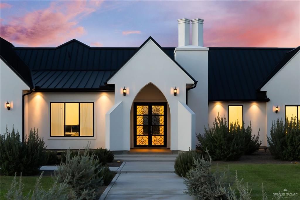 1215 Chelsea Drive Palmhurst, TX 78573 - Photo 5 of 30 a view of a house with a small yard