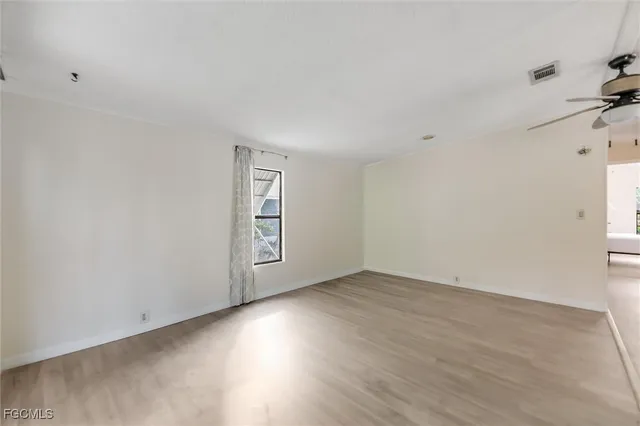 a living room with furniture a rug and a couch